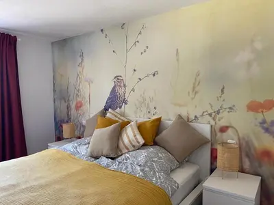 Ein Bett oder Betten in einem Zimmer der Unterkunft Vogelnest