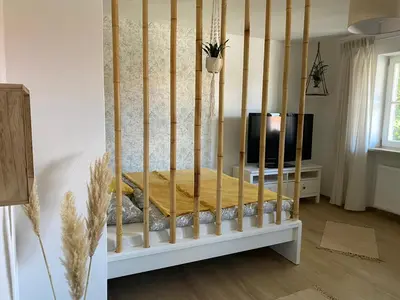 Ein Bett oder Betten in einem Zimmer der Unterkunft Vogelnest