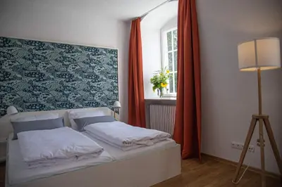 Ein Bett oder Betten in einem Zimmer der Unterkunft Klosterwirt Polling