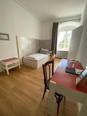 Ein Bett oder Betten in einem Zimmer der Unterkunft Klosterwirt Polling