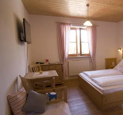 Ein Bett oder Betten in einem Zimmer der Unterkunft Gut Grasleiten