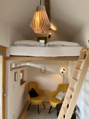 Ein Bett oder Betten in einem Zimmer der Unterkunft Mächlerhof