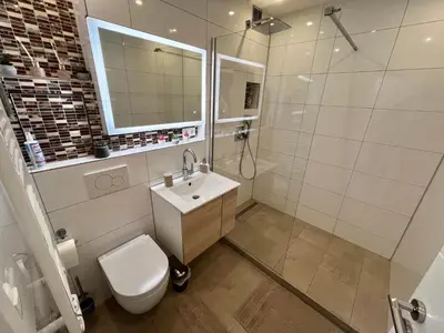 Ein Badezimmer in der Unterkunft Lilis Apartment mit Balkon