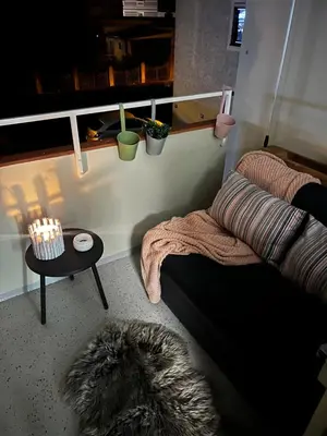 Ein Sitzbereich in der Unterkunft Lilis Apartment mit Balkon
