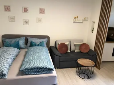 Ein Sitzbereich in der Unterkunft Lilis Apartment mit Balkon