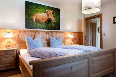 Ein Bett oder Betten in einem Zimmer der Unterkunft Landhaus Geierstanger