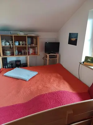 Ein Bett oder Betten in einem Zimmer der Unterkunft Apartment Moosblick zwischen Bergen und See