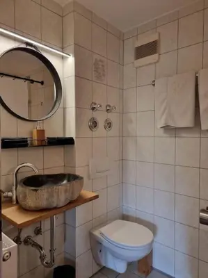 Ein Badezimmer in der Unterkunft Fritzis Alpenidyll „Sommertraum & Winterromantik”