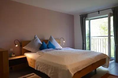 Ein Bett oder Betten in einem Zimmer der Unterkunft Gründl Prem Lechfelsen