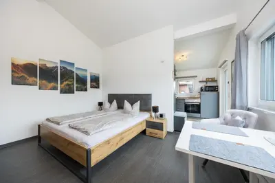 Ein Bett oder Betten in einem Zimmer der Unterkunft Ferienwohnung Morgensonne