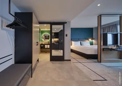 Ein Bett oder Betten in einem Zimmer der Unterkunft Dorint Hotel München/Garching