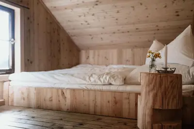 Ein Bett oder Betten in einem Zimmer der Unterkunft Haslauer Hüttn