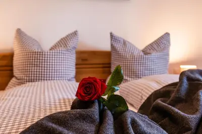 Ein Bett oder Betten in einem Zimmer der Unterkunft Ferienwohnungen Anton Geierstanger