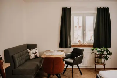 Ein Sitzbereich in der Unterkunft Wohnung Hochalm