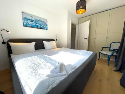 Ein Bett oder Betten in einem Zimmer der Unterkunft Ferienwohnung 