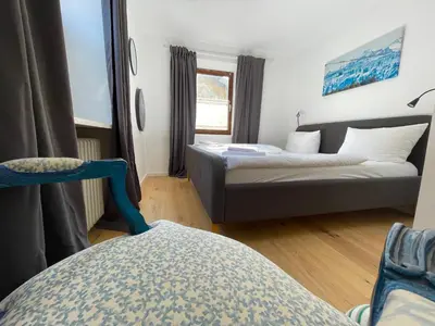 Ein Bett oder Betten in einem Zimmer der Unterkunft Ferienwohnung 