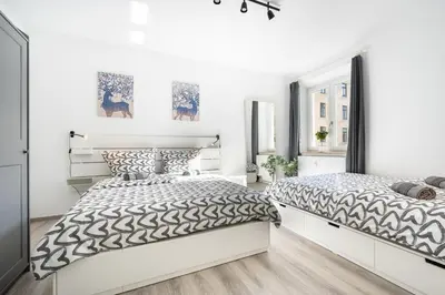 Ein Bett oder Betten in einem Zimmer der Unterkunft Apartment an der Theresienwiese