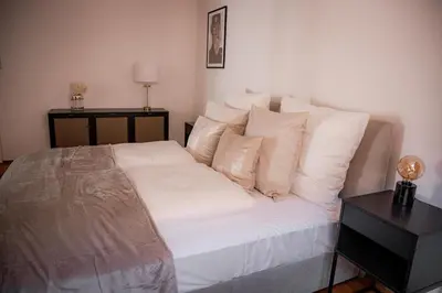 Ein Bett oder Betten in einem Zimmer der Unterkunft Bonnystay Landshut Gallery im Zentrum