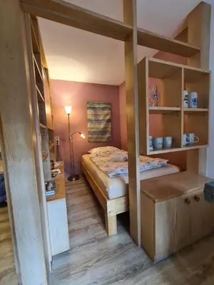 Ein Bett oder Betten in einem Zimmer der Unterkunft Ferienwohnung Sabine