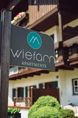 Ein Zertifikat, Auszeichnung, Logo oder anderes Dokument, das in der Unterkunft Wiefarn Apartments - Ferienwohnungen in Bad Wiessee am Tegernsee ausgestellt ist