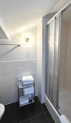 Ein Badezimmer in der Unterkunft Wiefarn Apartments - Ferienwohnungen in Bad Wiessee am Tegernsee
