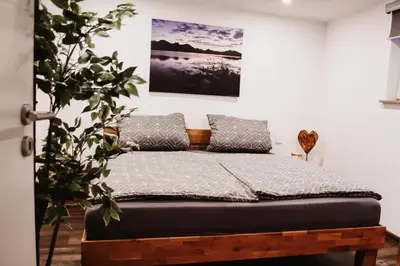 Ein Bett oder Betten in einem Zimmer der Unterkunft Ferienwohnung am Gruberbach