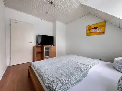 Ein Bett oder Betten in einem Zimmer der Unterkunft Great House for tourists and business