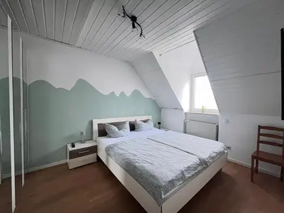 Ein Bett oder Betten in einem Zimmer der Unterkunft Great House for tourists and business