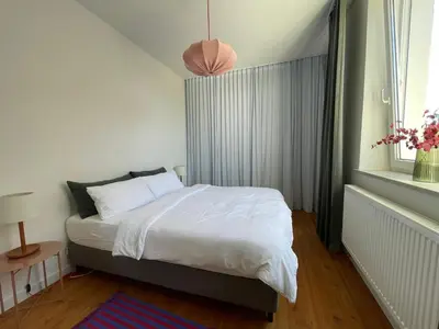 Ein Bett oder Betten in einem Zimmer der Unterkunft Charmante Stadtwohnung im Textilviertel