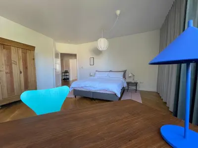 Ein Bett oder Betten in einem Zimmer der Unterkunft Charmante Stadtwohnung im Textilviertel