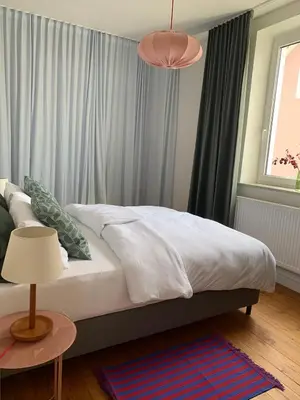 Ein Bett oder Betten in einem Zimmer der Unterkunft Charmante Stadtwohnung im Textilviertel