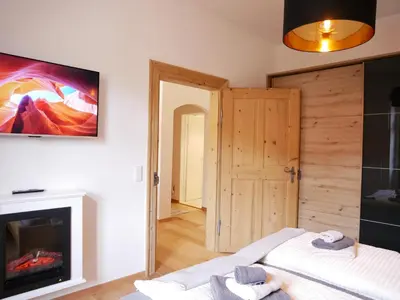 Ein Bett oder Betten in einem Zimmer der Unterkunft 2 Zimmer Ferienwohnung „Schliersberg“