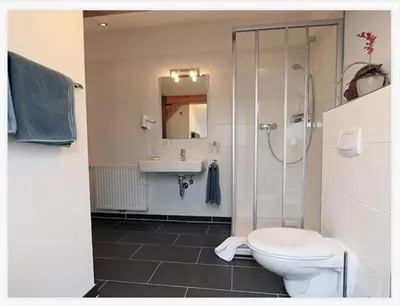 Ein Badezimmer in der Unterkunft L'Ulivo Italienische Restaurant und Pension