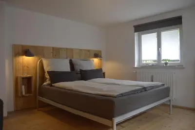 Ein Bett oder Betten in einem Zimmer der Unterkunft Herberge. 46