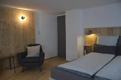 Ein Bett oder Betten in einem Zimmer der Unterkunft Herberge. 46