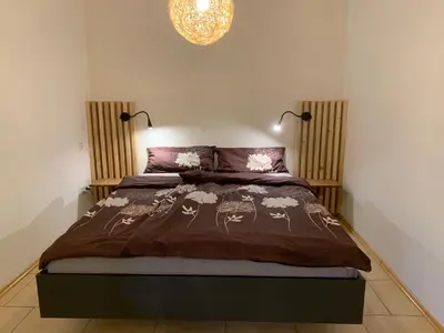 Ein Bett oder Betten in einem Zimmer der Unterkunft Ferienwohnung Spiel