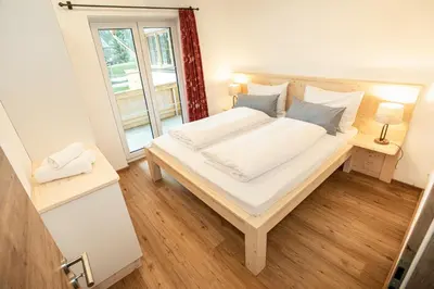 Ein Bett oder Betten in einem Zimmer der Unterkunft Ferienwohnungen 