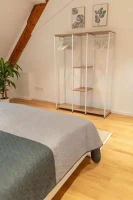 Ein Bett oder Betten in einem Zimmer der Unterkunft Ferienwohnung 