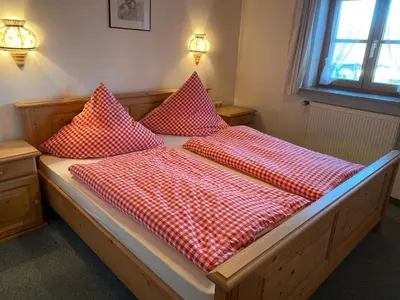 Ein Bett oder Betten in einem Zimmer der Unterkunft Landhaus-Bierling