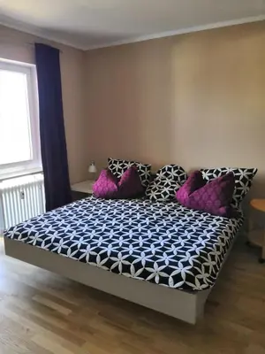 Ein Bett oder Betten in einem Zimmer der Unterkunft Ferienwohnungen Schelhas