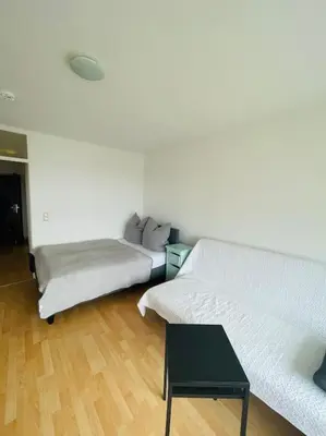 Ein Bett oder Betten in einem Zimmer der Unterkunft Sunrise Studio für 2-3 Personen