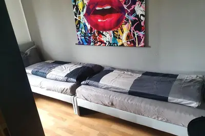 Ein Bett oder Betten in einem Zimmer der Unterkunft Work & stay apartment with balcony near Ingolstadt