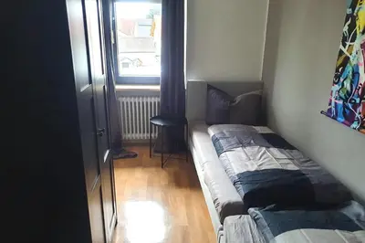 Ein Bett oder Betten in einem Zimmer der Unterkunft Work & stay apartment with balcony near Ingolstadt