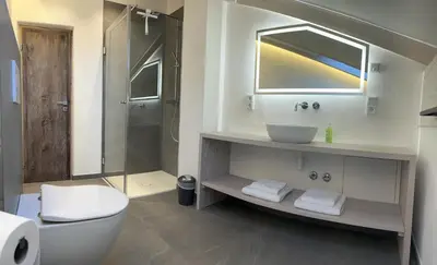 Ein Badezimmer in der Unterkunft Ferienwohnung Atelier Simetsberg