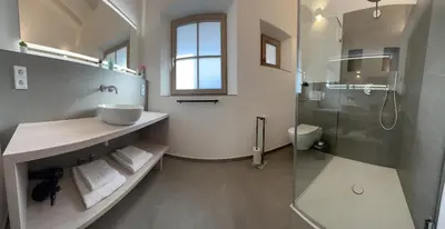 Ein Badezimmer in der Unterkunft Ferienwohnung Atelier Simetsberg