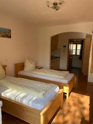 Ein Bett oder Betten in einem Zimmer der Unterkunft Ferienwohnungen Familie Sappl