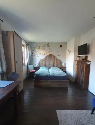 Ein Bett oder Betten in einem Zimmer der Unterkunft 'Sissi' ein zaubehaftes Apartement im modernen Landhausstil