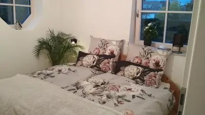 Ein Bett oder Betten in einem Zimmer der Unterkunft Villa Florentina
