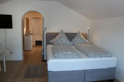 Ein Bett oder Betten in einem Zimmer der Unterkunft Wohnung Bergtraum inmitten der Ammergauer Alpen