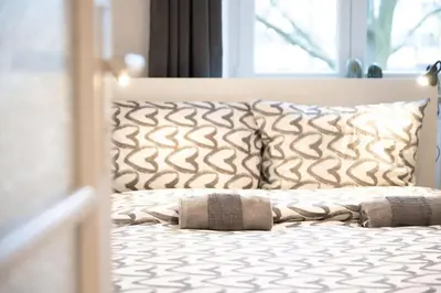 Ein Bett oder Betten in einem Zimmer der Unterkunft Apartment close to Theresienwiese